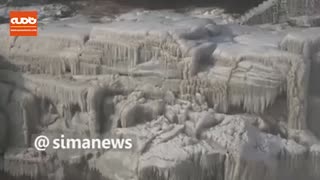 تصویری زیبا از رنگین کمان بر آبشار  رود زرد چین